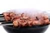 Making barbecue on the grill stock photography