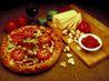 How to Grill With a Pizza Stone and Charcoal