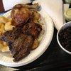 Ultimate Mixed Grill w/fried yuca and rice & beans.