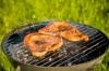 Grilled meat on the grill a sunny summer day
