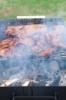 Bbq ribs and bacon on a grill with