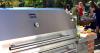 Outdoor Grill Cooks with Gas and Charcoal