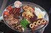 The ultimate meat feast This grill contains over 5 000 calories would YOU dare