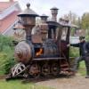 Steampunk BBQ grill in form of a locomotive engine
