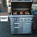 DCS gas grill with salmon, chicken