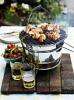 Meat kebabs on table grill